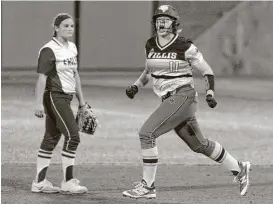  ?? Jason Fochtman / Houston Chronicle ?? Rachel Brown, right, celebrates after her game-ending, two-run homer in the ninth inning of Game 3 as Willis wins the Region III-5A finale Saturday night.