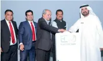  ?? Supplied photo ?? Mohammed Al Muallem, Thumbay Moideen and other officials at the Electric Way event in Dubai on Wednesday. —