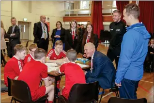  ??  ?? Youngsters from the Govan Project meet Sports Minister Joe FitzPatric­k