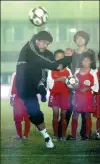  ?? PROVIDED TO CHINA DAILY ?? Maradona shows his soccer skills during a trip to Dongguan, Guangdong province, in November 2010.