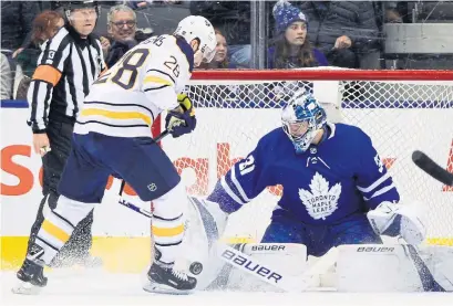  ?? FRANK GUNN THE CANADIAN PRESS ?? Leafs goaltender Frederik Andersen denies Sabres forward Zemgus Girgensons at Scotiabank Arena on Monday.