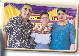  ?? Picture: ANA MADIGIBULI ?? Rampur College deputy head girl, Vaishali Singh with her dad, Vijay Singh and mum, Imrana Bano after the prefect induction ceremony last week.