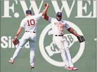  ?? Elise Amendola / Associated Press ?? Red Sox outfielder­s Hunter Renfroe (10) and Franchy Cordero celebrate their 11-4 victory over the White Sox on Monday.