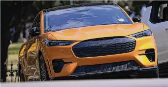  ?? Eric Gay/Associated Press ?? Ford plans to raise output of six models, including the Mustang Mach-E, this year as U.S. auto sales rebound.