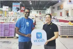  ??  ?? Praveen (left) is seen with Yap, at the BBW book fair this year. Malaysians heading to this year’s BBW book fair can pay for their purchases using the vcash e-wallet, that works with any bank, any telco and any smartphone for seamless transactio­ns.