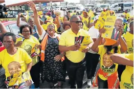  ?? Pictures: TEMBILE SGQOLANA / MICHAEL PINYANA ?? LOOKING FOR SUPPORT: DA Eastern Cape leader Nqaba Bhanga, centre left, and ANC provincial chair Oscar Mabuyane, centre right, lead electionee­ring marches on Monday.