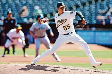  ?? Scott Strazzante/The Chronicle ?? On Saturday, Adrian Martínez became the first A’s pitcher to throw live batting practice in spring training.