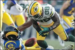  ?? — AP ?? Packers running back Ty Montgomery fumbles on a punt return that led to a loss against the Rams on Sunday.