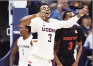  ?? Jessica Hill / Associated Press ?? UConn’s Alterique Gilbert reacts to a play in a 2020 game against Houston in Storrs.