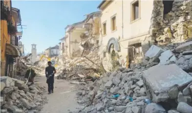  ?? Associated Press photos ?? wednesday. The same scene after a 6.2-magnitude earthquake struck. Italy’s civil protection agency said the death toll had risen to 250 by Thursday afternoon, with more than 180 of the fatalities in Amatrice.