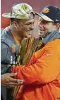  ?? Streeter Lecka / Getty Images ?? Clemson QB Deshaun Watson, left, and coach Dabo Swinney bask after one of the best title games.