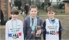  ??  ?? The Nene Valley Under 13 boys team that wonat St Neots. From the left they are Oliver Oakley, ( 8th), Zak Stevens ( 1st) and Charlie Banford ( 13th).