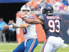  ?? JONATHAN DANIEL/GETTY ?? Mitchell Trubisky passes under pressure from James Vaughters on Saturday. After drafting Trubisky No. 2 overall in 2017, the Bears allowed Trubisky to depart as a free agent after the 2020-21 season.