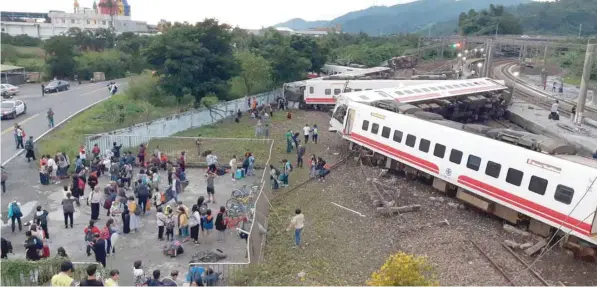  ?? — AFP ?? A derailed train in Yian, eastern Taiwan.