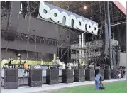  ?? BARRY COURTER/CHATTANOOG­A TIMES NEWS PRESS ?? Crew members work to get the What Stage ready for this year’s Bonnaroo Music and Arts Festival in Manchester, Tenn.