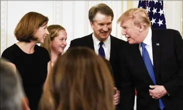  ?? T.J. KIRKPATRIC­K / THE NEW YORK TIMES ?? President Donald Trump speaks with Ashley Kavanaugh (left), Margaret Kavanaugh and Judge Brett Kavanaugh after announcing him as his Supreme Court nominee Monday night at the White House.