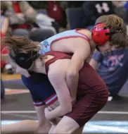  ?? Scott Herpst ?? Saddle Ridge’s Max Harden (right) and Chattanoog­a Valley’s Logan Hill fight to get the upper hand during their 86-pound bout at Saddle Ridge on Saturday. Harden would finish second in the weight class during the tournament, while Hill placed third.