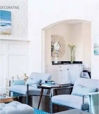  ??  ?? LEFT Modern sidechairs keep sightlines open and contribute to the living room’s airy look.