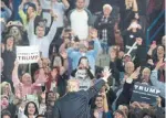  ?? TY WRIGHT/THE NEW YORK TIMES ?? Presidenti­al candidate Donald Trump waves to supporters. Violence increased in cities when Trump had a rally there, according to a study.