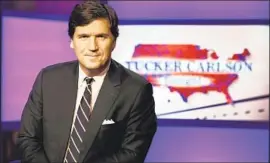  ?? Richard Drew Associated Press ?? TUCKER CARLSON is the undisputed star of Fox News Channel, yet his toprated program has seen an exodus of top-tier advertiser­s over the years.