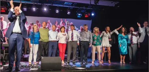  ??  ?? Top, the family of Larry Delaney gather on stage and below, the packed house. Picture: Tony Campbell.