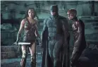  ??  ?? The superheroe­s converge in “Justice League.” CLAY ENOS, WARNER BROS. PICTURES