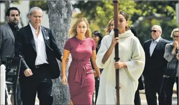  ?? Christina House Los Angeles Times ?? CARLI SKAGGS, the wife of Angels pitcher Tyler Skaggs, attends his memorial in Santa Monica. She said her decision to speak was last minute. “I didn’t think I’d be able to do it. Tyler gave me some strength.”