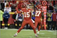  ?? ED ZURGA — THE ASSOCIATED PRESS ?? Chiefs quarterbac­k Patrick Mahomes (15) throws against the Bengals in Kansas City, Mo., Sunday.