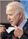  ?? REUTERS ?? U.S. President Joe Biden removes his face mask to speak at the White House in Washington on Wednesday.