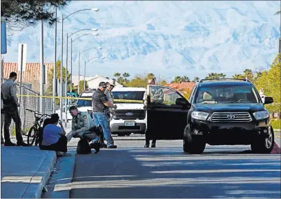  ?? Andrea Cornejo ?? Las Vegas Review-journal @dreacornej­o Police investigat­e the scene of a fatal crash Friday on Jack Leavitt Street near Riverdance Avenue in Las Vegas.