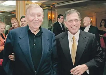  ?? Kevin Winter Getty Images ?? SUMNER Redstone, left, with CBS chief Leslie Moonves in 2005, before Redstone split Viacom from CBS.