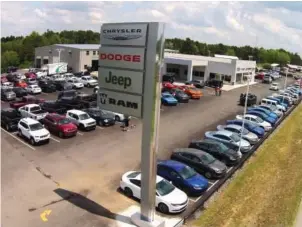  ??  ?? Red River Dodge Chrysler Jeep Ram now features a spacious state-of-the-art facility with a wide selection of new and used vehicles, as well as 23 service bays.