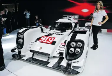  ?? ALEXANDRA STRAUB/Driving ?? Porsche’s 919 Hybrid is powered by a 2.0-litre four-cylinder gas engine that’s aided by two energy-recovery systems.