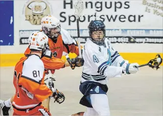  ?? BOB TYMCZYSZYN
THE ST. CATHARINES STANDARD ?? Latrell Harris, right, shown in action against Six Nations in this July 2017 file photo, is captain of the St. Catharines A’s junior A lacrosse team.