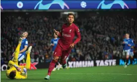  ?? Photograph: DeFodi Images/Getty Images ?? Roberto Firmino scored twice in Liverpool’s crushing victory against Rangers.