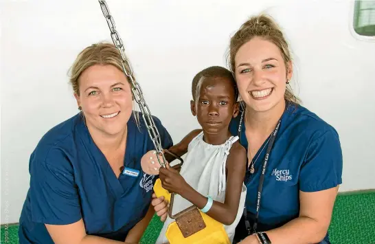  ?? PHOTOS: MERCY SHIPS/SUPPLIED ?? Christchur­ch radiology technician Becca Bell, Mohammed and Lauren Spring.