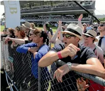  ??  ?? The best advice for a first-time cup-goer: ‘‘Start the day with style and end it with dignity.’’