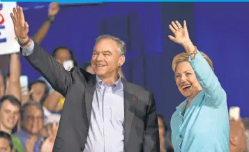  ?? DAVID ALBERS, NAPLES DAILY NEWS ?? Democrat Hillary Clinton introduces running mate Tim Kaine on Saturday in Miami.