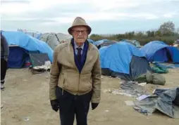  ?? COURTESY SMITH FAMILY ?? Harry Leslie Smith visits a refugee camp in Calais, France, to better understand the migrant crisis. He will write his next book on refugees.