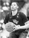  ?? SEAN RAYFORD/AP ?? Frank Bertz scored 13 points, which tied for UCF’s high Tuesday, but that couldn’t prevent a loss against Miami.