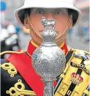  ??  ?? The Royal Marines Band, above, will be joined by Liam Forrest.