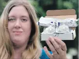  ?? MATHEW MCCARTHY WATERLOO REGION RECORD ?? Amanda Wade of Cambridge holds a Naloxone kit at her home Wednesday. She got the kit from a pharamacis­t coming into the city from the London-area.