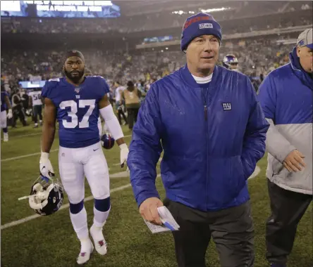  ?? SETH WENIG - THE ASSOCIATED PRESS ?? File-Ths Dec. 29, 2019, file photo shows New York Giants head coach Pat Shurmur leaving the field after an NFL football game against the Philadelph­ia Eagles, Sunday in East Rutherford, N.J.