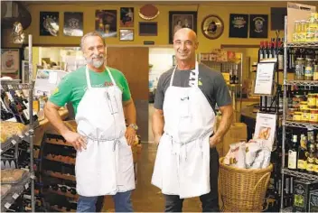  ?? K.C. ALFRED U-T PHOTOS ?? Freshly made pasta is sold at Assenti’s Pasta in Little Italy. Roberto Assenti (left) and his brother Luigi transition­ed into ownership of the shop founded by Mama Adriana Assenti in the early 1980s.