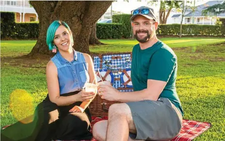  ??  ?? POPULAR ONLINE: The winner of The Chronicle Bachelor and Bacheloret­te competitio­n Tim Swinson and Aleisha Cowan enjoy a picnic in Laurel Bank Park.