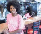  ??  ?? Owner Danielle Johnson has reopened The Waffle Iron at 4969 Park Ave. BRAD VEST/THE COMMERCIAL APPEAL