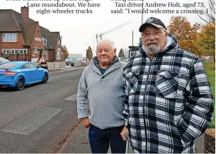  ?? PETITION: Picture: Pete Stonier ?? Malcolm Phillips and Jim Gibson in Chell Heath Road.