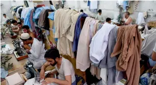  ?? AFP ?? Textiles comprise Pakistan’s largest industry, forming 60 per cent of its industrial sector, employing 40 per cent of its entire industrial labour force and is the biggest exporter and dollar earner. —