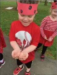  ?? SUBMITTED PHOTOS ?? Left: Students were dressed for the occasion in the likeness of ladybugs, wearing red and black clothing and ladybug hats.