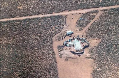  ?? AFP ?? This undated photo released by the Taos County Sheriff’s Office shows a view of the compound in Amalia, new Mexico. —